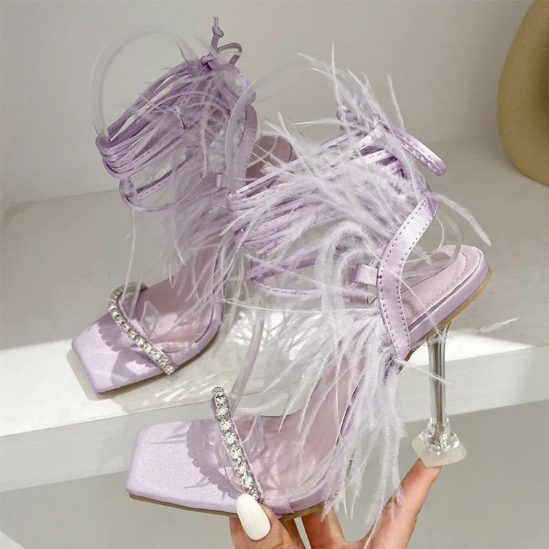 

Pesstwei New Design Womens Sandals Fashion Fuzzy Feather Summer Transparent High Heels Sexy Nightclub Stripper Shoes Purple Green 35 фиолетовый