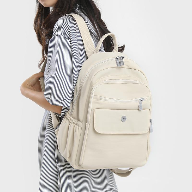 Einfarbiger Rucksack Große Kapazität Outdoor-Reisetasche Studenten Leichter Pendlerrucksack