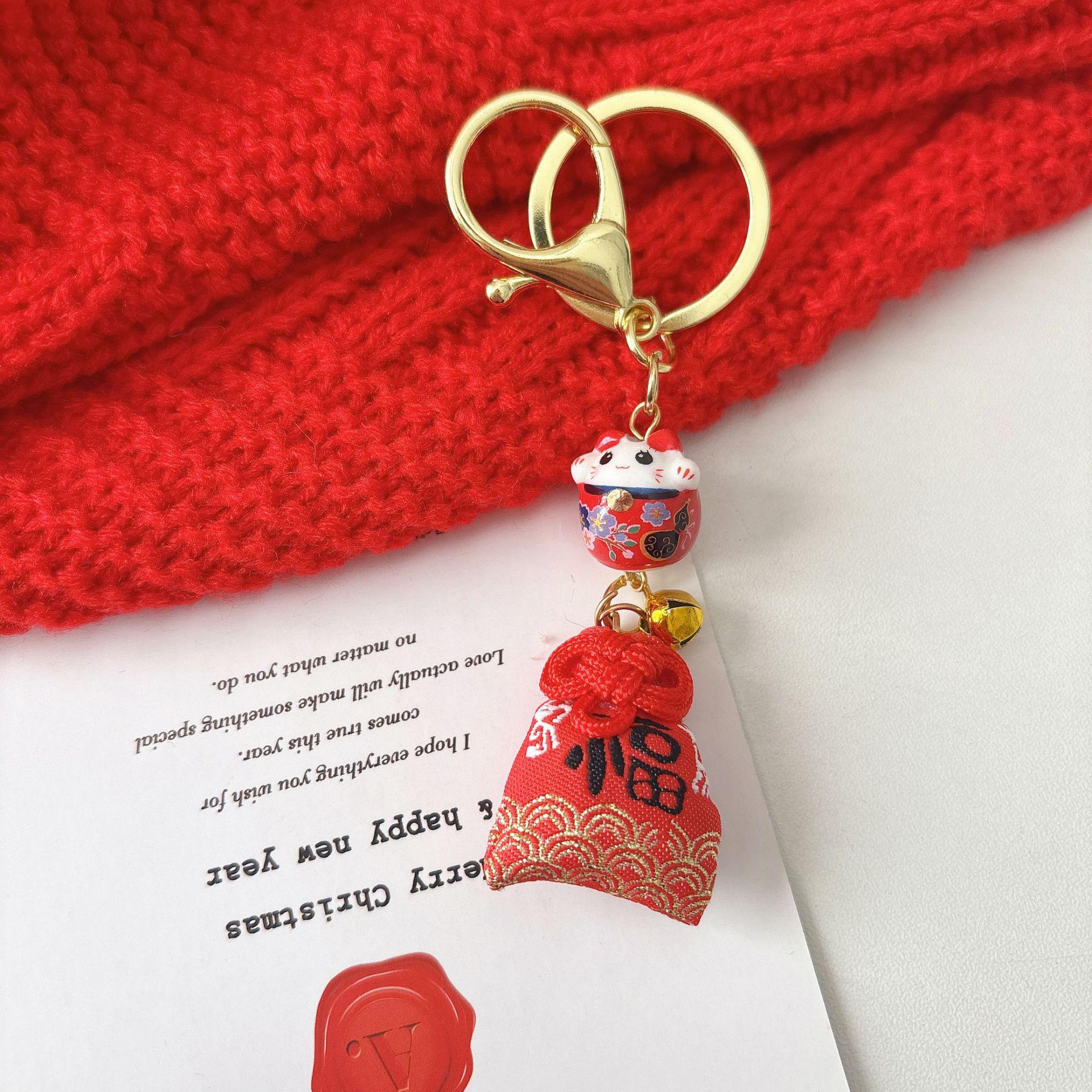 Omamori Charm: Pink Beckoning Cat with Gold and Jade - Ceramic Keychain Pendant for Blessing Gift