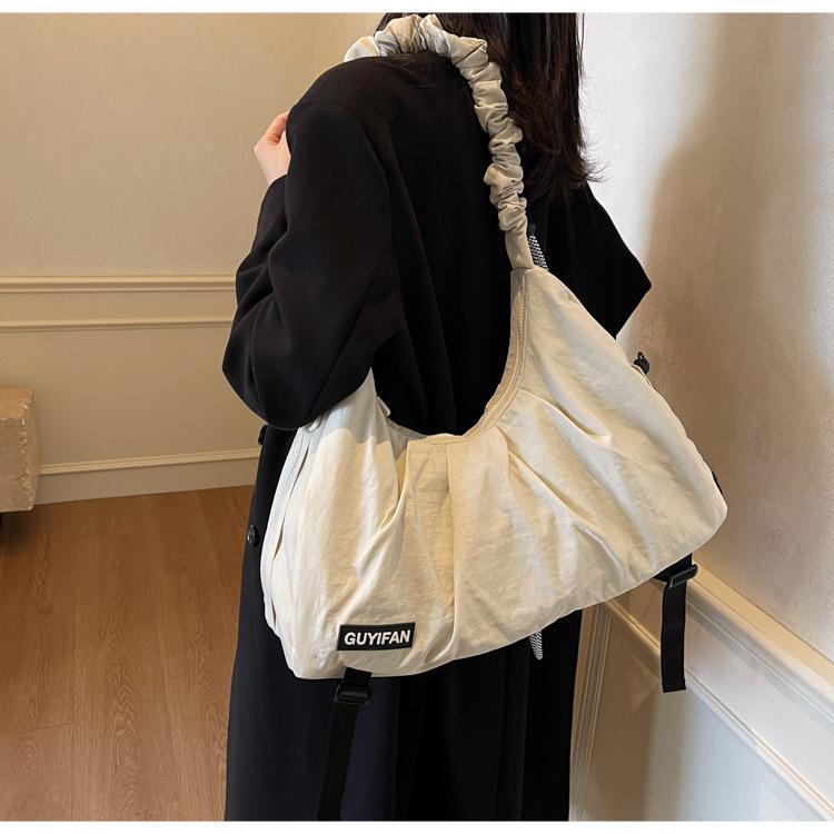 Women's Japanese bag, pleated solid color dumpling bag.