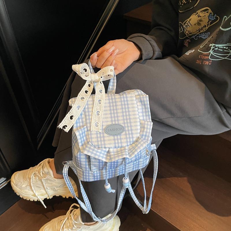 Wind lace plaid backpack autumn new niche design fluffy ruffle edge diagonal span bag women