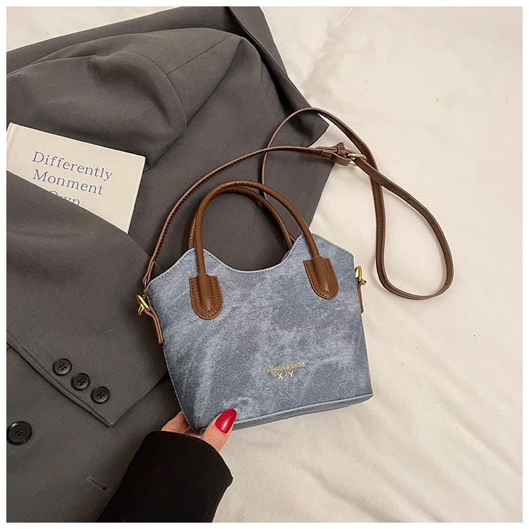 

Premium retro small bag, new spring and summer versatile messenger bag, fashionable portable bucket bag tide