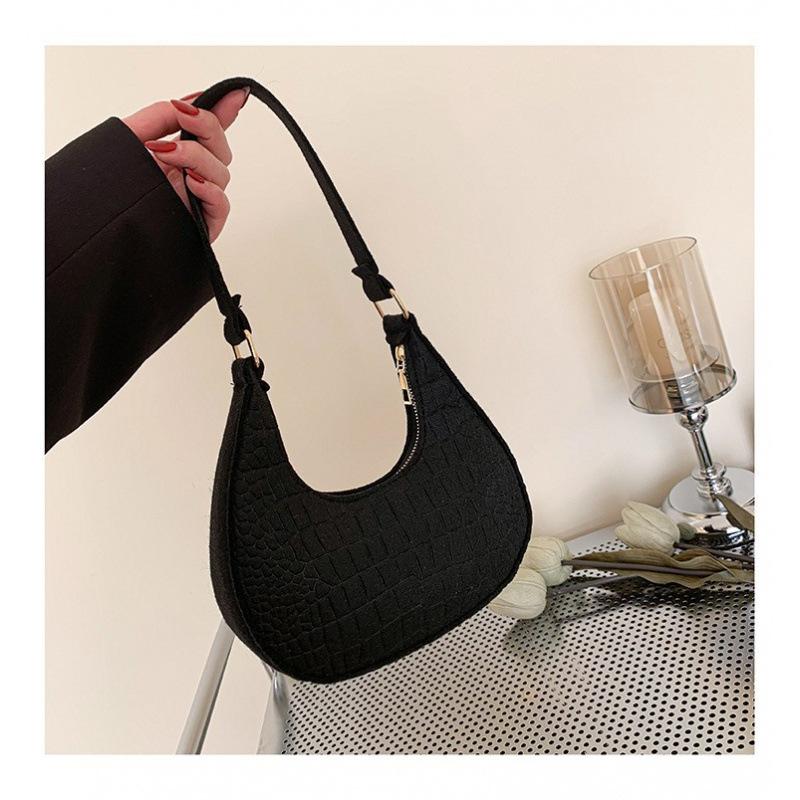 Solid color fashion women's bag trend autumn new stone pattern armpit bag casual shoulder handbag