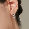 Tirr Lirr Tizen Maximize Twist Wave Silver-White Earrings TEDSVW14031M