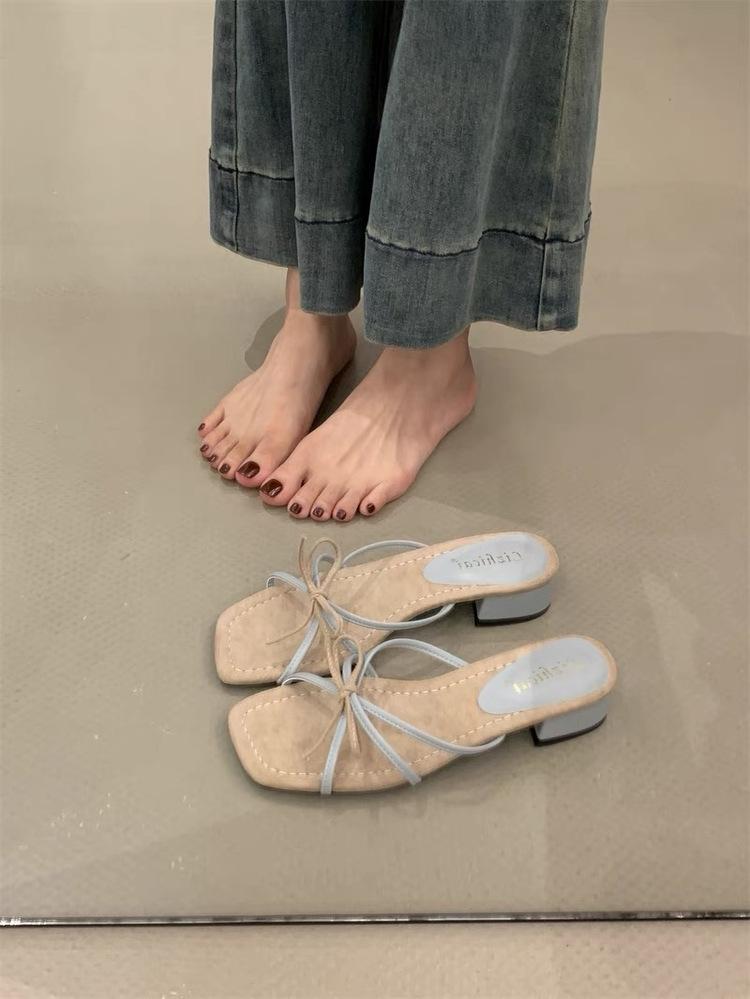 

Versatile not tired feet thick heel open toe thick bottom one word slippers female summer wear Korean fairy wind beautiful woman cool slippers 35