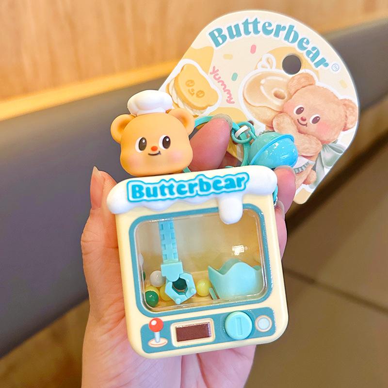 Butter Bear Keychain, Claw Doll Machine, Cartoon Toy, Exquisite Schoolbag, Pendant, Keychain. No specifications
