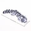 3D Printed Articulated Tiger Statue Smooth Edges Movable Joints for Living Room Shelf Decor
