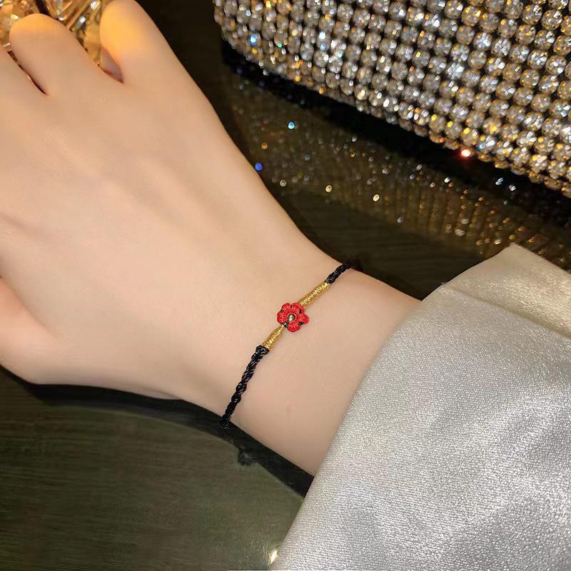 Yi Yangqianxi's Red Flower Hand-Woven Ethnic Bracelet for Women