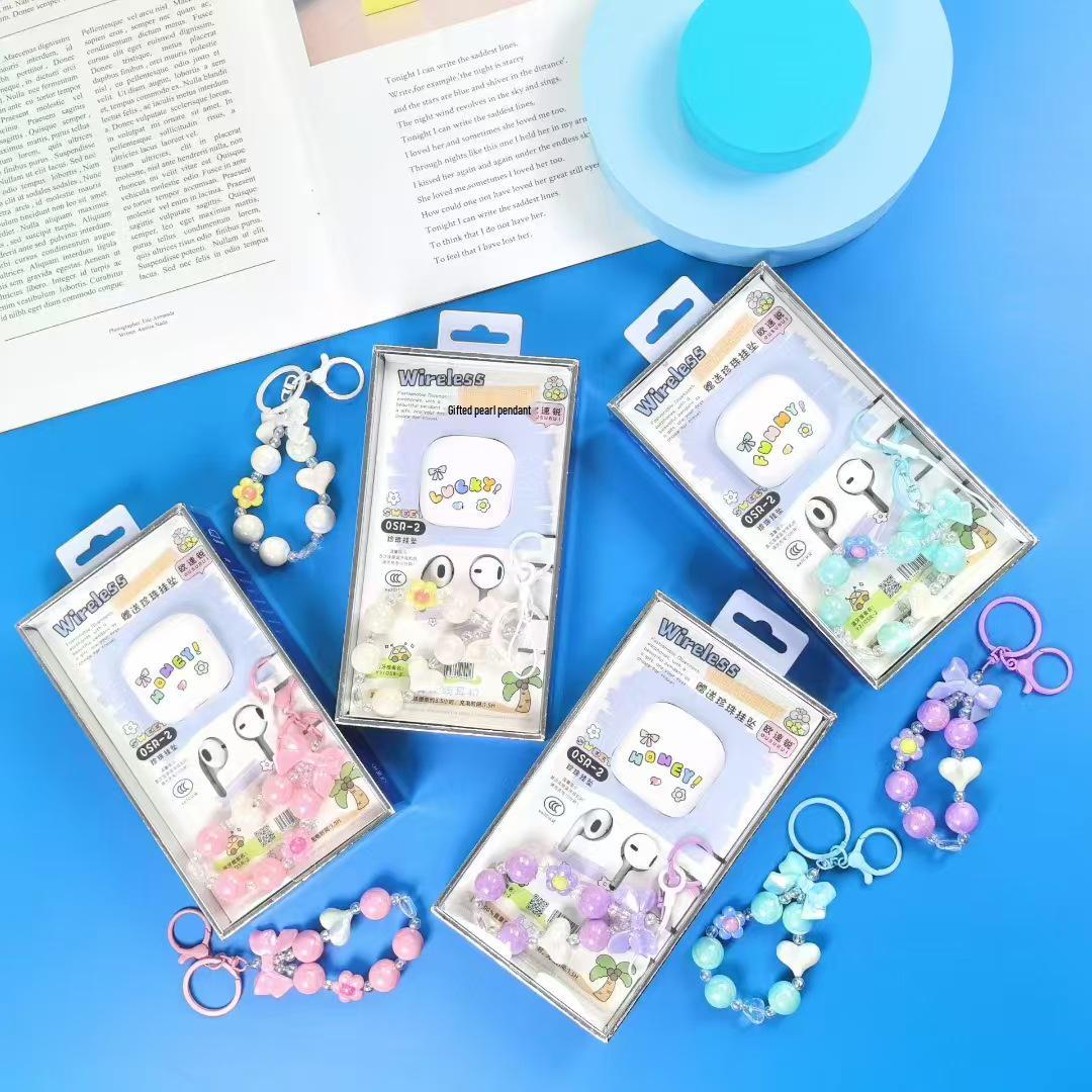 

2025 New Style Cartoon Bluetooth Sports Earphones with Cute Packaging Cat Fluffy Ball Keychain