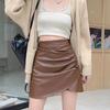 Spicy Girl High-Waisted PU Leather Skirt: Irregular Pleated, Slimming A-Line, Short Skirt for Autumn/Winter 2023