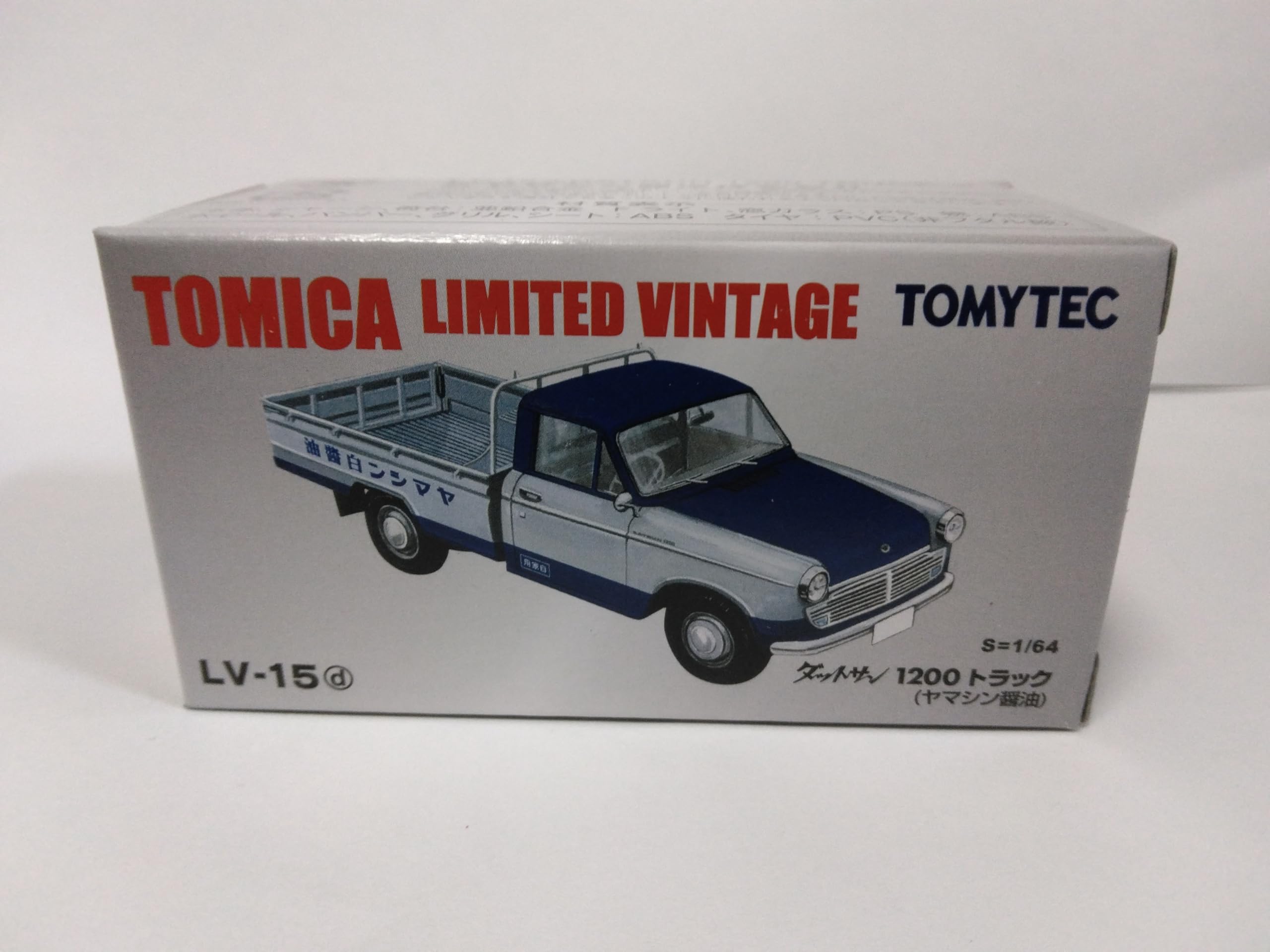 

Tomica Limited Vintage Datsun 1200 Yamashin Soy Sauce LV-15d Темно-синій