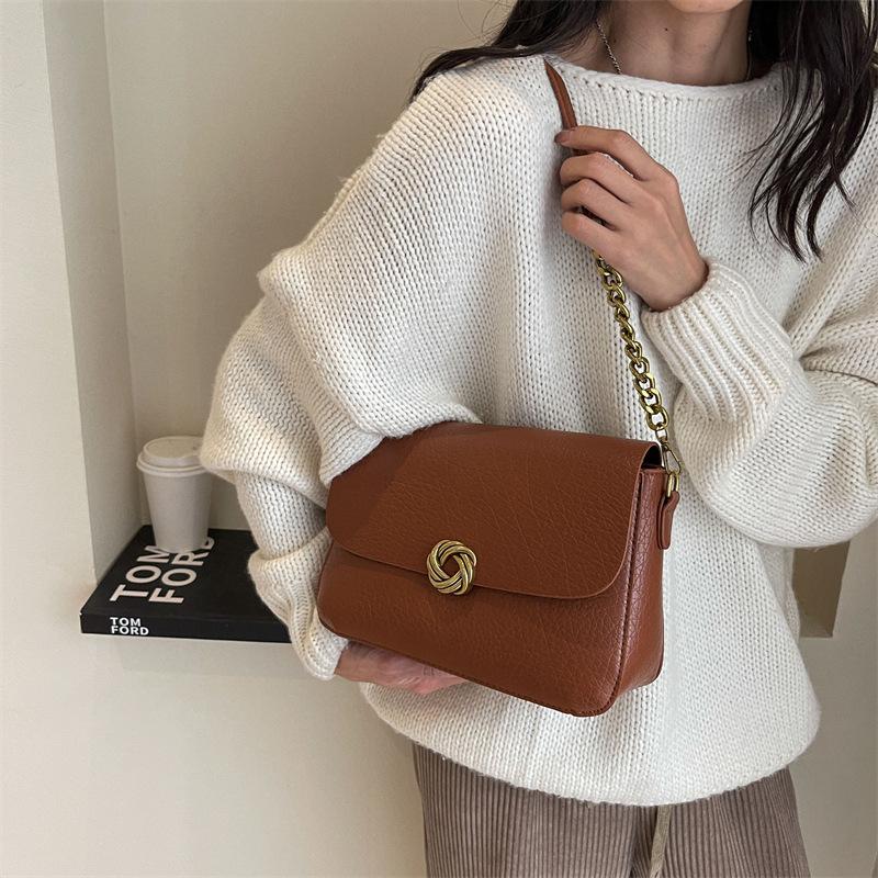 

Advanced sense of foreign style small bag women s 2025 new popular messenger bag single shoulder armpit bag retro small square bag коричневий