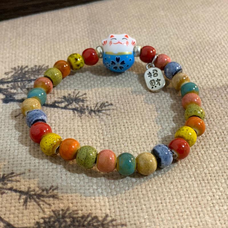 

Милый мультяшный браслет с изображением счастливого кота для женщин и девочек, цветные эластичные браслеты с бусинами, керамические браслеты с подвесками в виде кота, ювелирные изделия, подарки