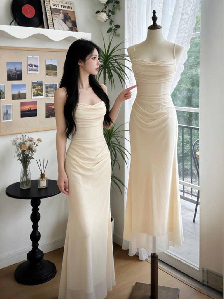 Sexy royal sister style solid color off-the-shoulder pleated suspender dress slim-fitting high-waisted hip-wrapped long dress women's summer wholesale