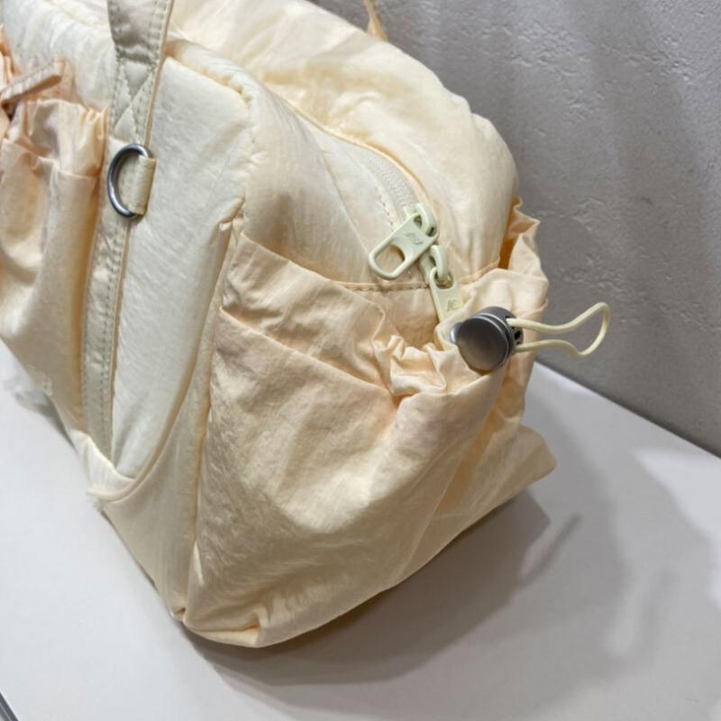 New Balance Glossy Ribbon Duffel Bag Nbgcfsw105 Light Yellow New Balance Glossy Ribbon Duffel Bag Nbgcfsw105 Light Yellow