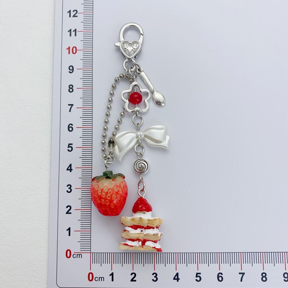 Fashion Unique Bow Heart Phone Charm Cute Creative Strawberry Cake Pendant Keychain Luxury Phone Lanyard Bag Phone Accessories