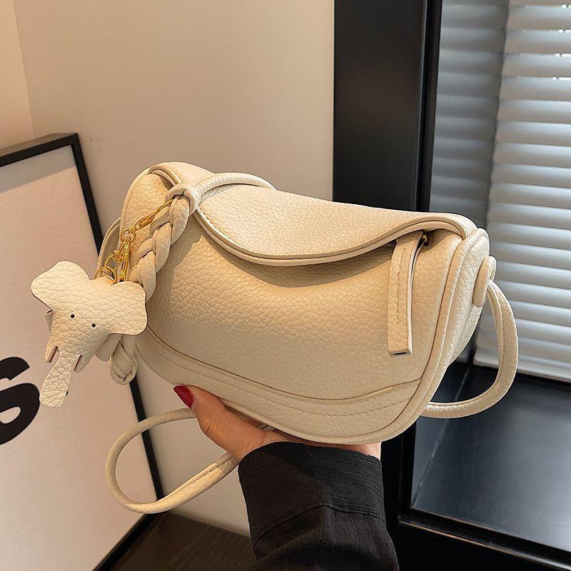 

High-value French niche bag women s 2025 new shoulder messenger bag popular niche versatile saddle dumpling bag