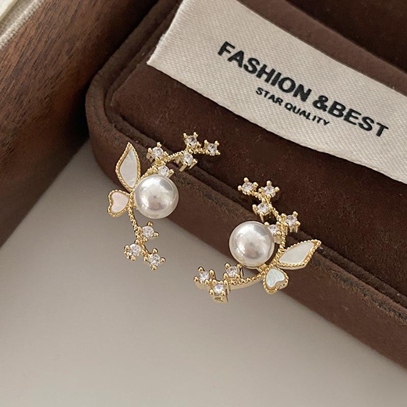 

Крылья бабочки Жемчужный гвоздик Простой дизайн Sense Niche Женская мода Легкий Роскошный Высококачественный Универсальный Циркон