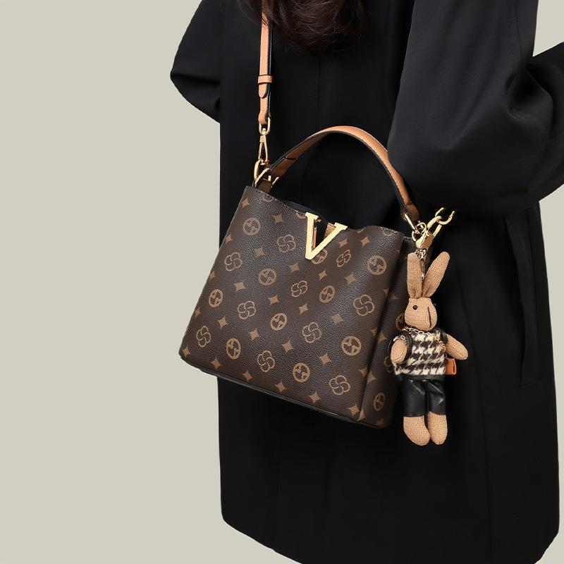 Borsa a secchiello da donna nuova borsa da donna borsa a tracolla messenger borsa a mano di alta gamma per pendolari con motivo floreale vecchio