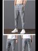 2023 Men's Korean-Style Ice Silk Casual Pants, Quick-Drying, Trendy, Loose-Fit Nine-Point Sports Pants for Summer.