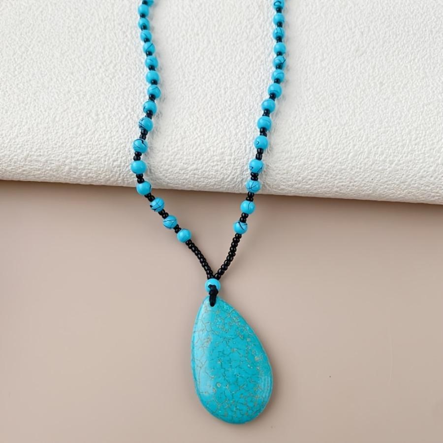 A Long Necklace Resembling Blue Turquoise with a Vintage Teardrop Pendant, Elegant And Stylish in a Bohemian Style, Perfect for Sweaters