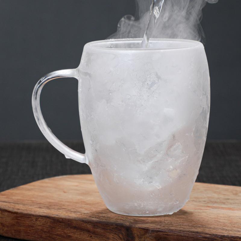 Egg-Shaped Double-Walled Borosilicate Glass Cup with Handle - Insulated for Coffee or Milk.