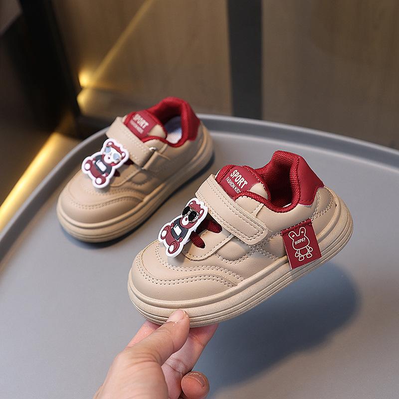 Frühlings- und Herbst-Jungen- und Mädchen-einfarbige, vielseitige Cartoon-Sportschuhe mit weicher Sohle