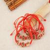 Peach Wood Carved Zodiac Bead Bracelet with Red String