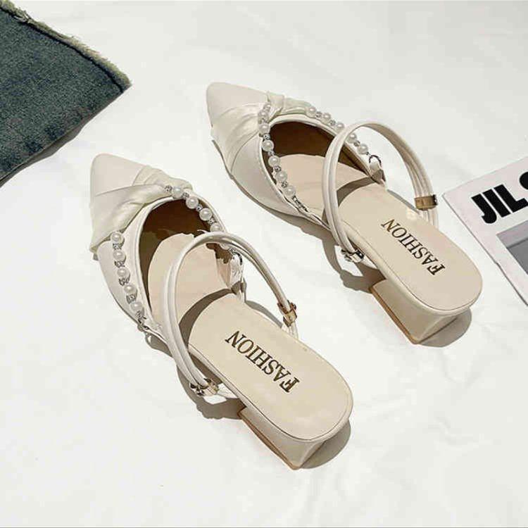 Summer evening breeze low-heeled sandals French beautiful bag head new summer wear semi-drag pointed single shoes