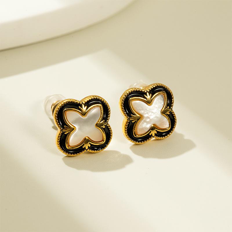 

Черные серьги-капли из кружева с клевером с серебряной иглой 925 пробы