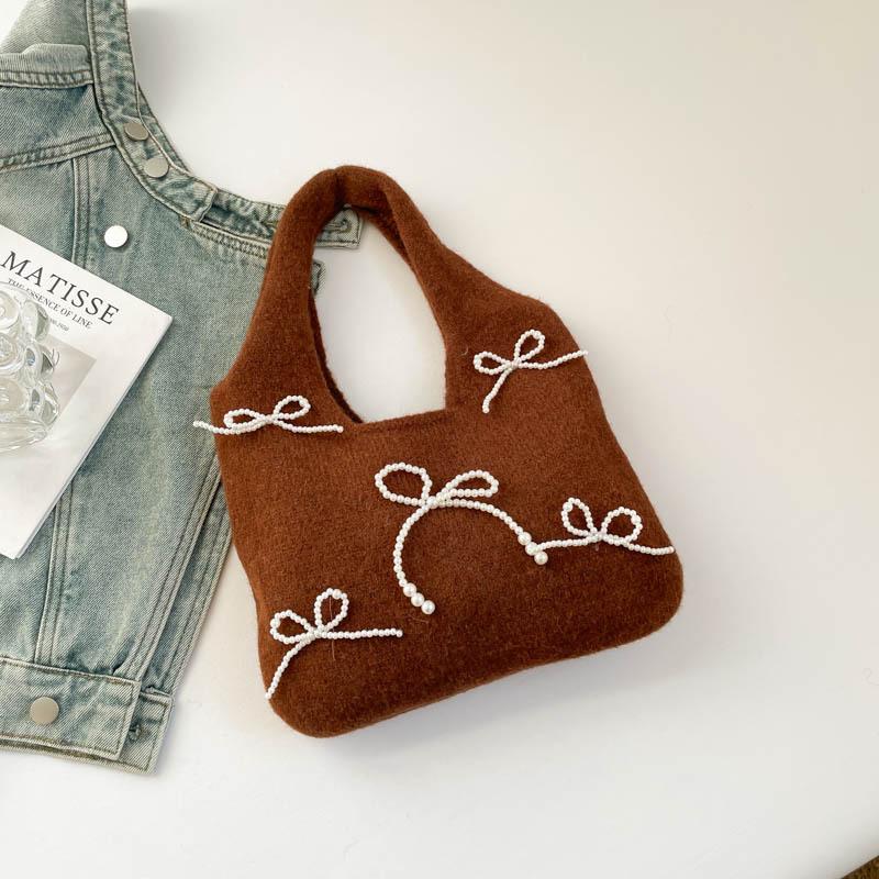 

High-value pearl bow High-value simple handbag Women s underarm bag Lazy wind hand carry vest bag коричневий