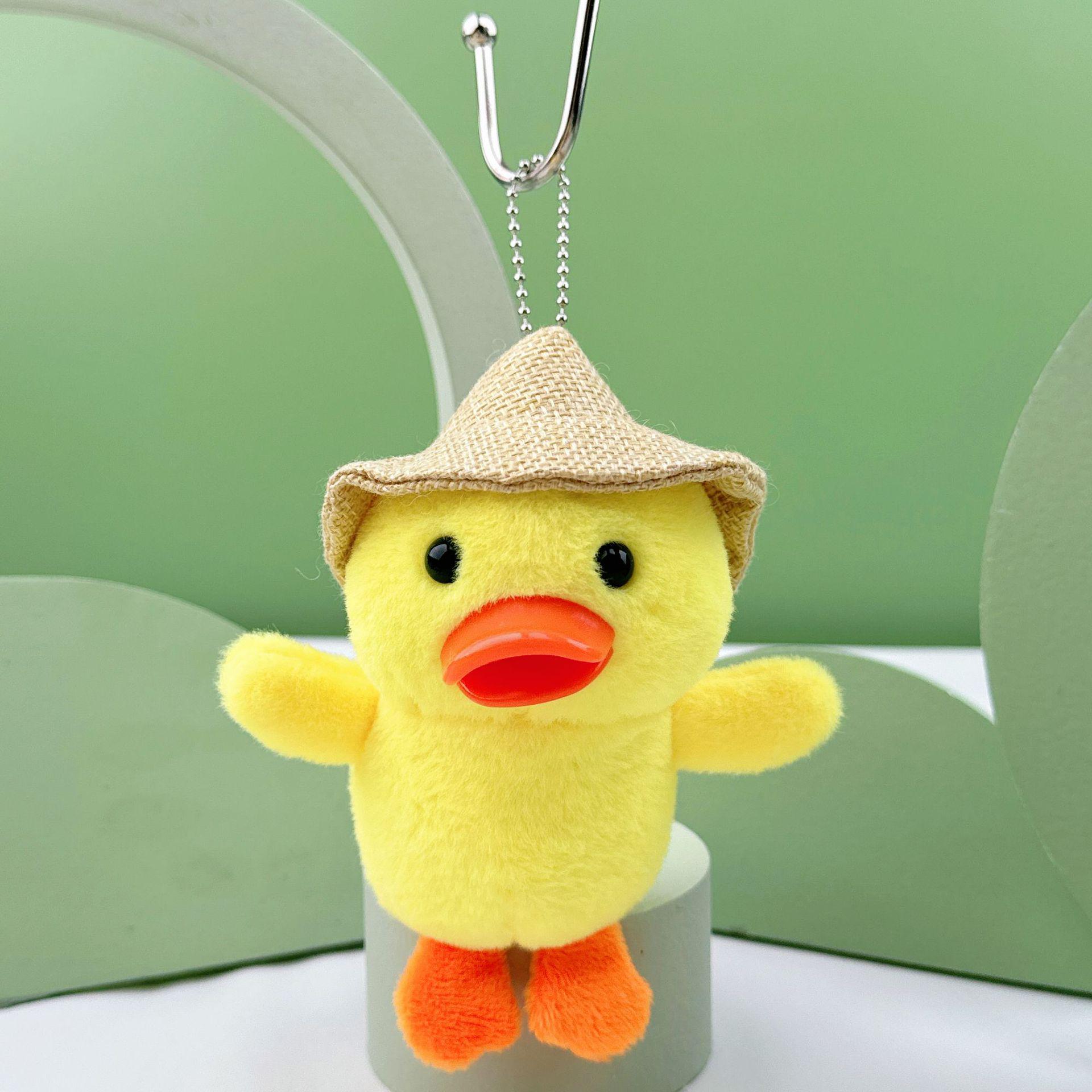 

Милый плюшевый брелок-кукла в соломенной шляпе в виде утенка из Дуинь - Шарм для сумки «Гадкий утенок» Height 13 cm