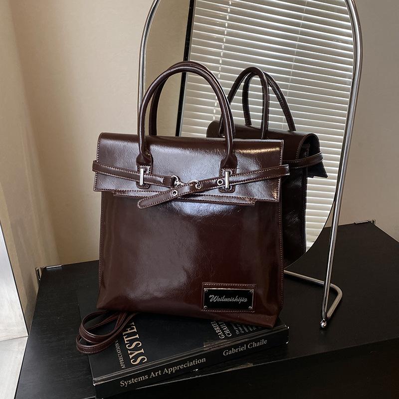 

Нишевый дизайн рюкзак женский новый ретро сумка-тоут для通勤 в колледж, рюкзак большой вместимости