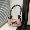 Pink super fire bow crescent armpit bag women's summer 2025 new high-end light luxury niche shoulder small square bag