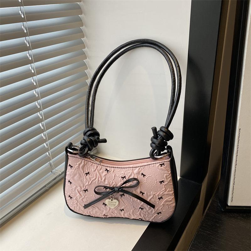 Pink super fire bow crescent armpit bag women's summer 2025 new high-end light luxury niche shoulder small square bag