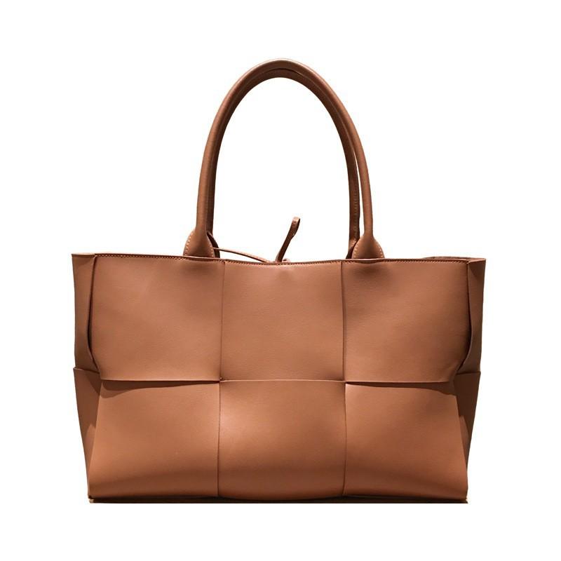 Foreign trade cross-border cowhide woven tote bag genuine leather 2026 new portable large bag shoulder bag large capacity armpit bag