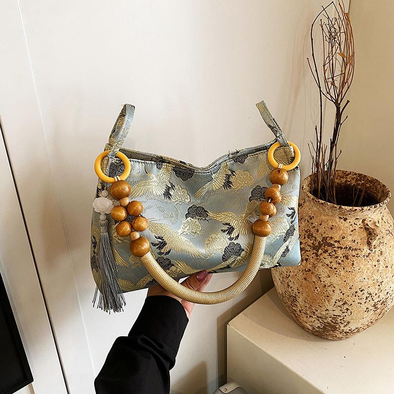 Nowa torba retro w chińskim stylu damska 2025 nowa casualowa niszowa torebka modna prosta torba na ramię poduszka