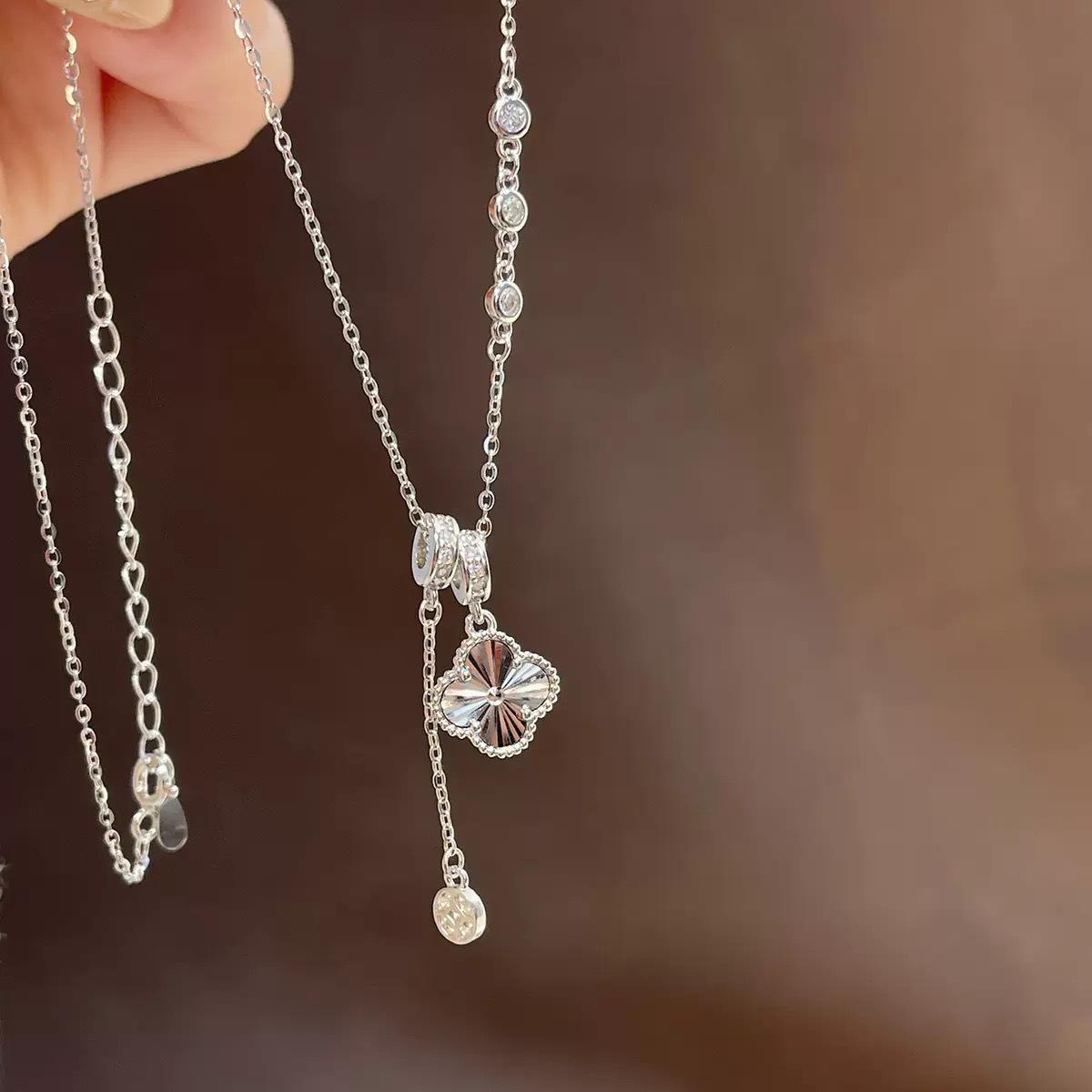 

Silver-Plated Laser-Cut Five-Flower Clover Tassel Necklace - Women s Sparkling Sweater Chain with a Celebrity-Inspired Design