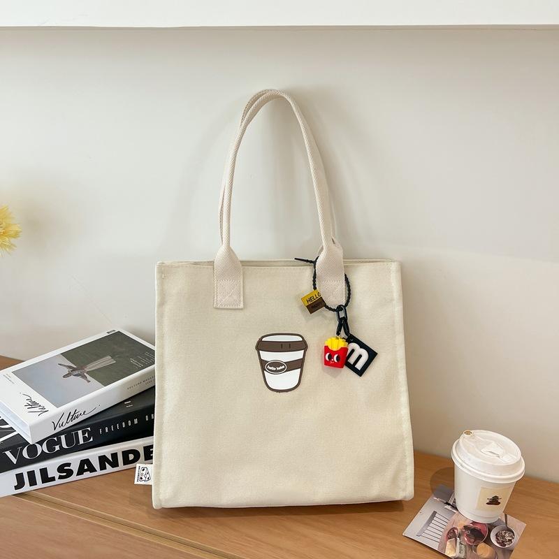 

2025 новая простая холщовая сумка большой вместимости для поездок на работу, модная сумка-тоут, женская повседневная простая зарубежная сумка через плечо no pendant