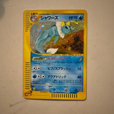 Used Vaporeon  Pokmon Card E Expansion Pack 4th Expansion "Ripped Earth" Holo 027...