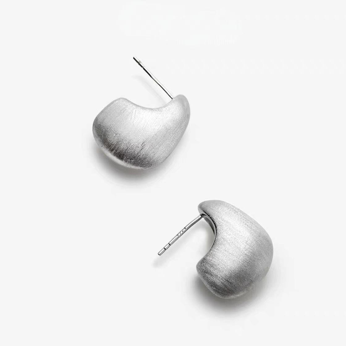 

Korean Brushed Round Bead Earrings: Simple, Versatile, High-End Studs with Niche Cold Style Design for Women.