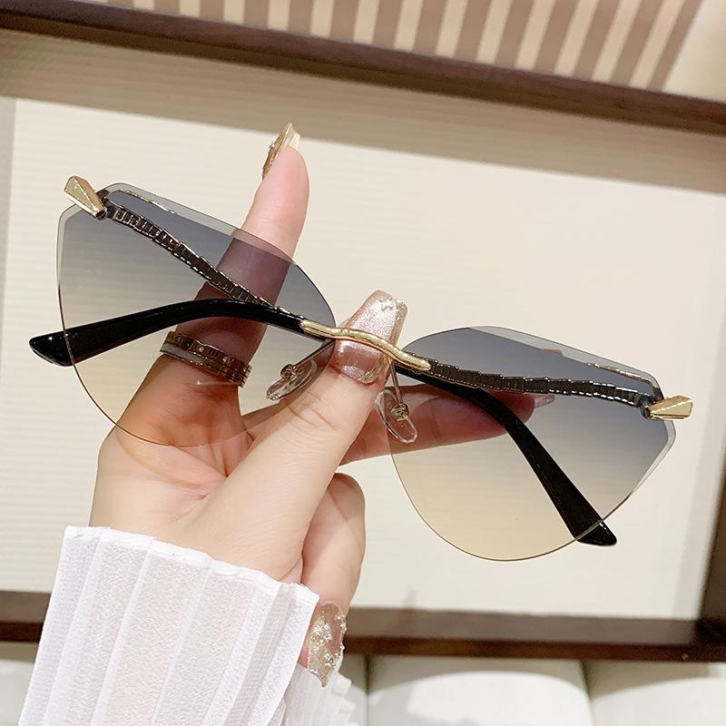 Snake Leg Rimless Trimmed Cat Eye Sunglasses Personalized Sunglasses Spice Girl Sunscreen Women'S Large Frame Sunglasses