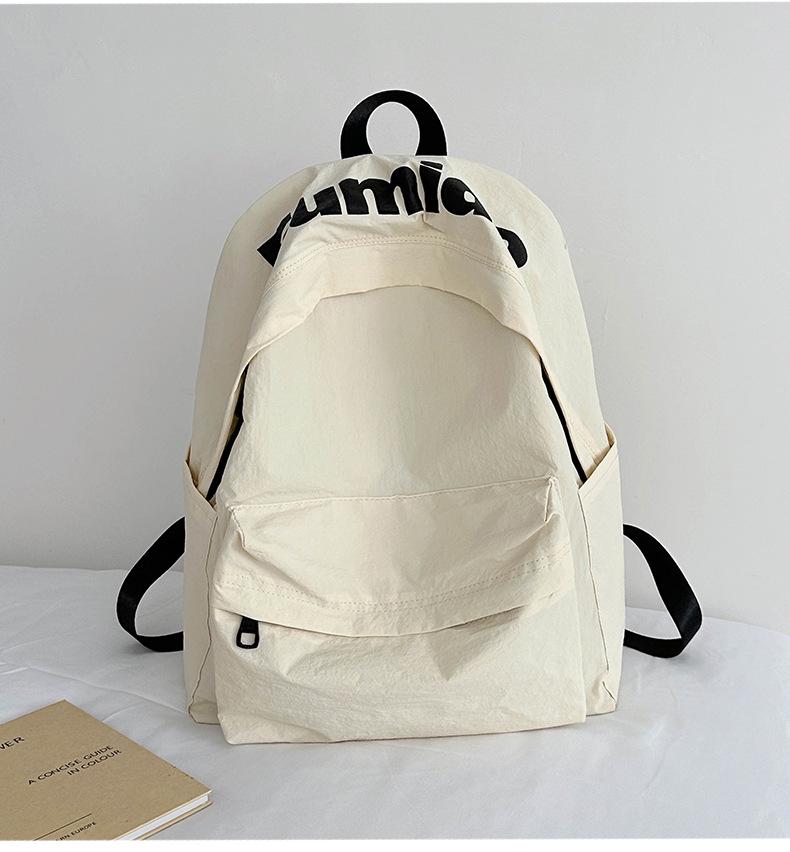 Lightweight Minimalist Backpack for Female Students: Versatile Double-Shoulder Bag for School and Travel.
