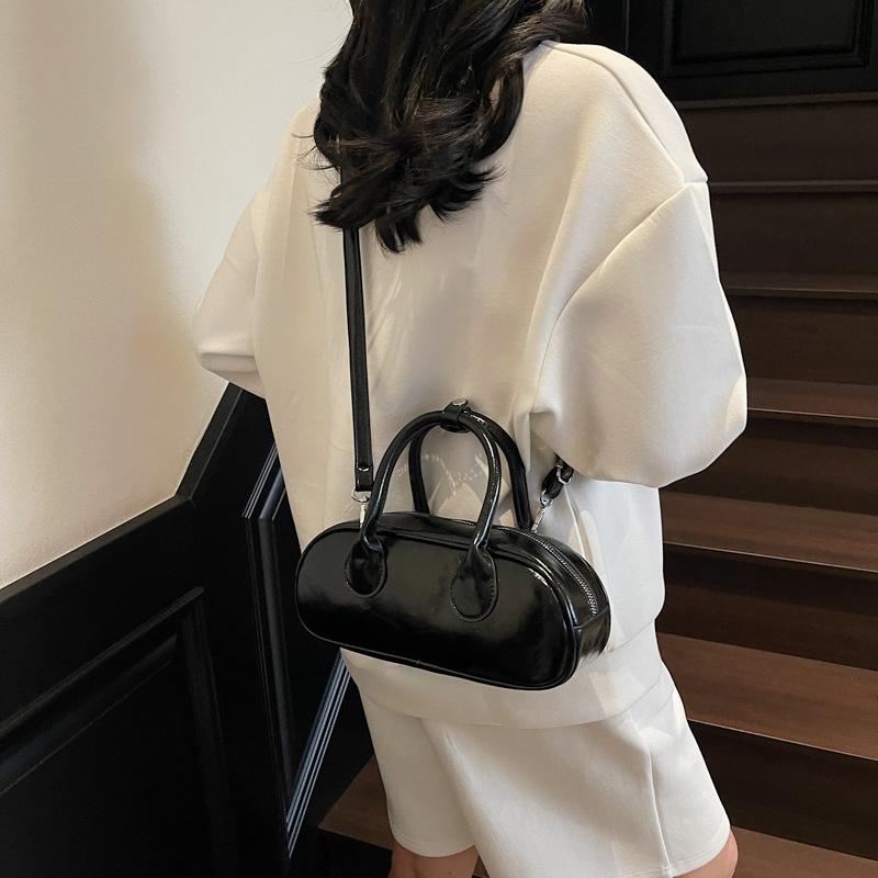 New niche high-end sense simple solid color personality versatile fashion portable messenger women's bag