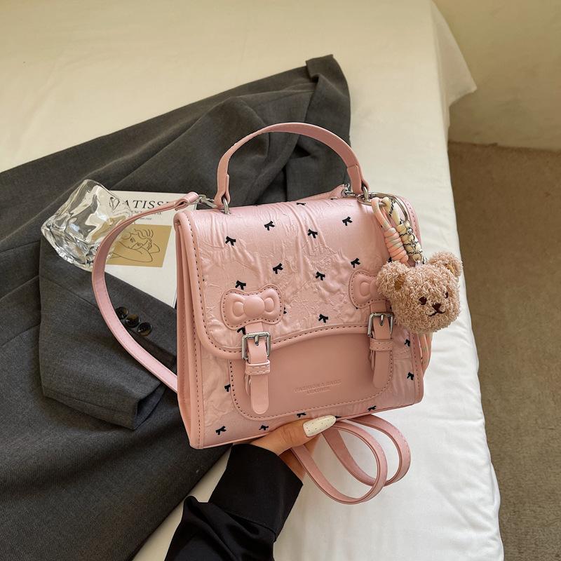 

2025 new bow sweet simple backpack women, versatile fashion niche messenger portable small square bag no pendant