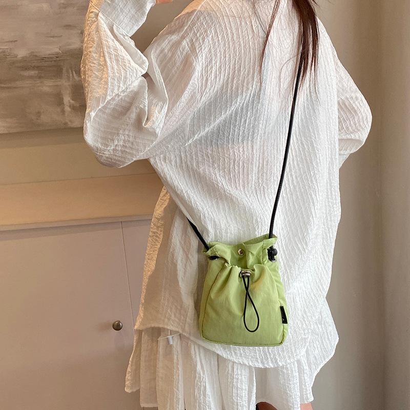 Minimalist Sports Style Mobile Bag for Women 2026 New Drawstring Canvas Small Bag Versatile Mini Crossbody Bag Coin Purse