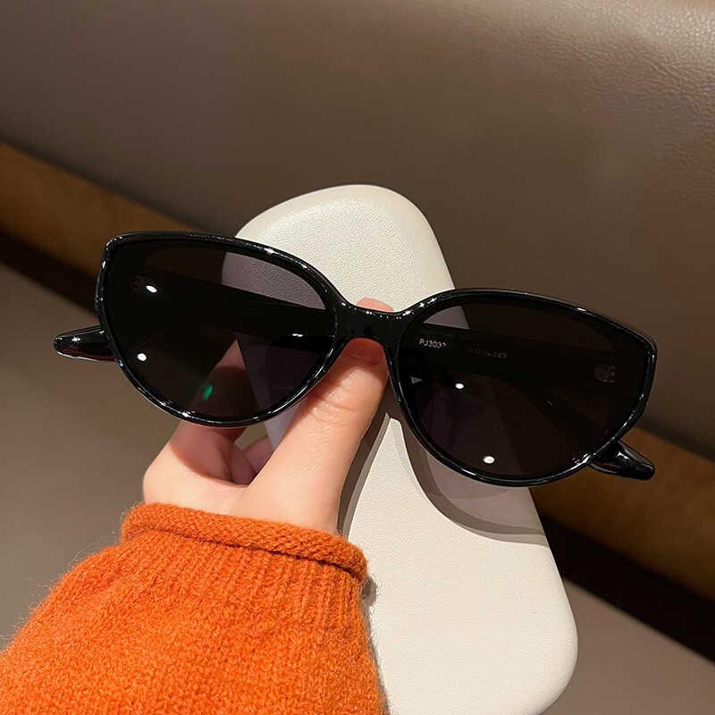 

Street photography cat s eye European and American sunglasses retro black polarized sunglasses women s advanced sense sunshade and UV protection tide
