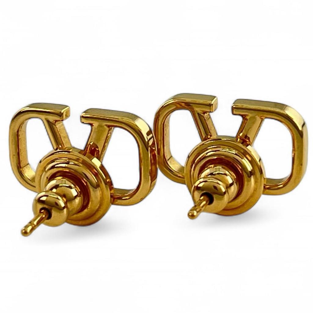 Valentino Garavani Pierce V Logo Signature Binaural złoty Damski ZW2J0G76MET Używany