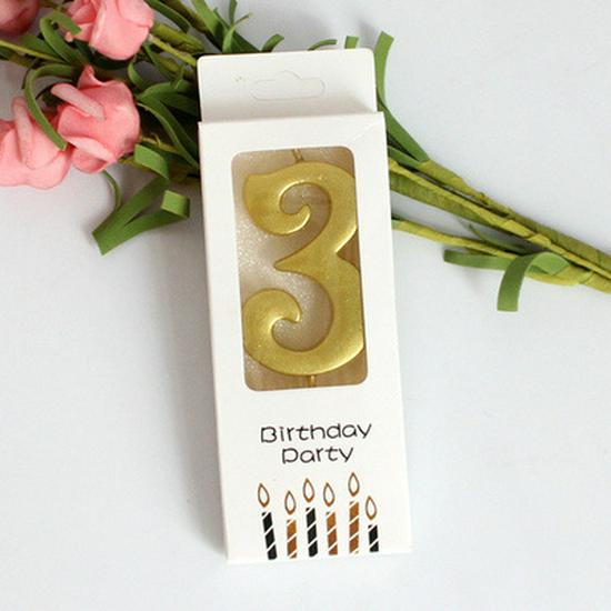 Gold Number Cake Candles for Birthday Celebrations - Party Decoration Arrangement.