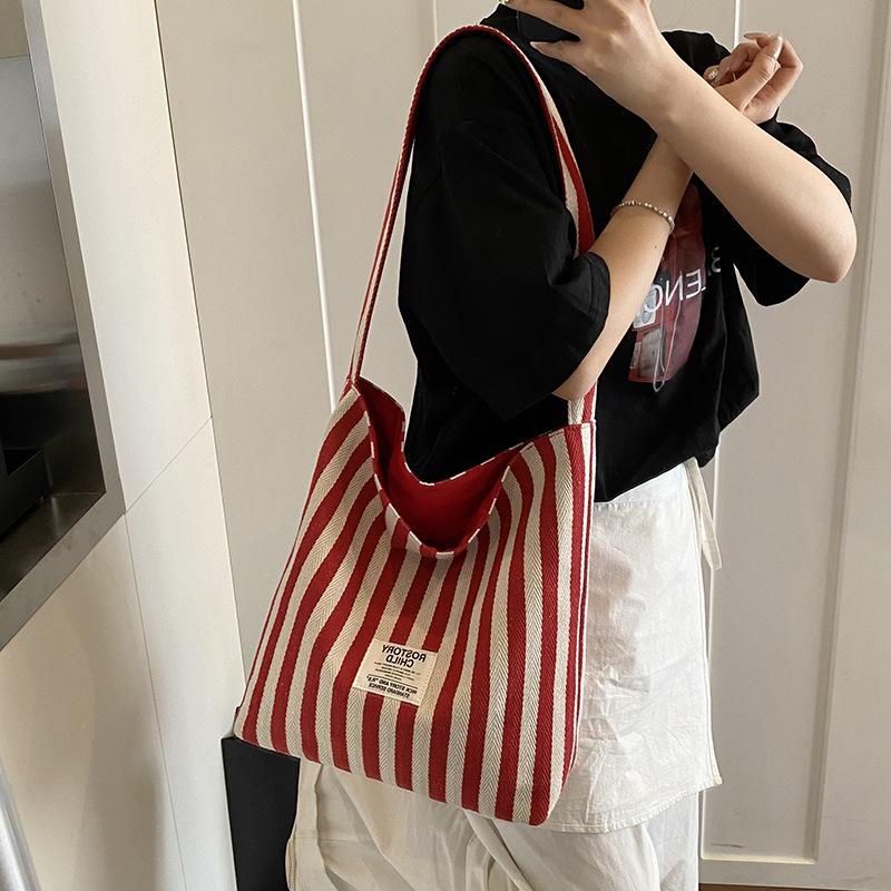 Large-capacity canvas bag women's 2025 new casual contrasting color versatile shoulder handbag, college student class tote bag